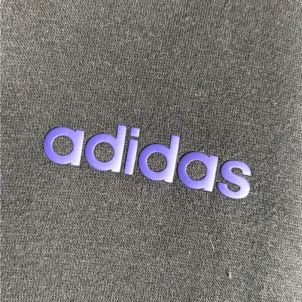 Adidas Black Zip-Up Hoodie with Purple Detail‎